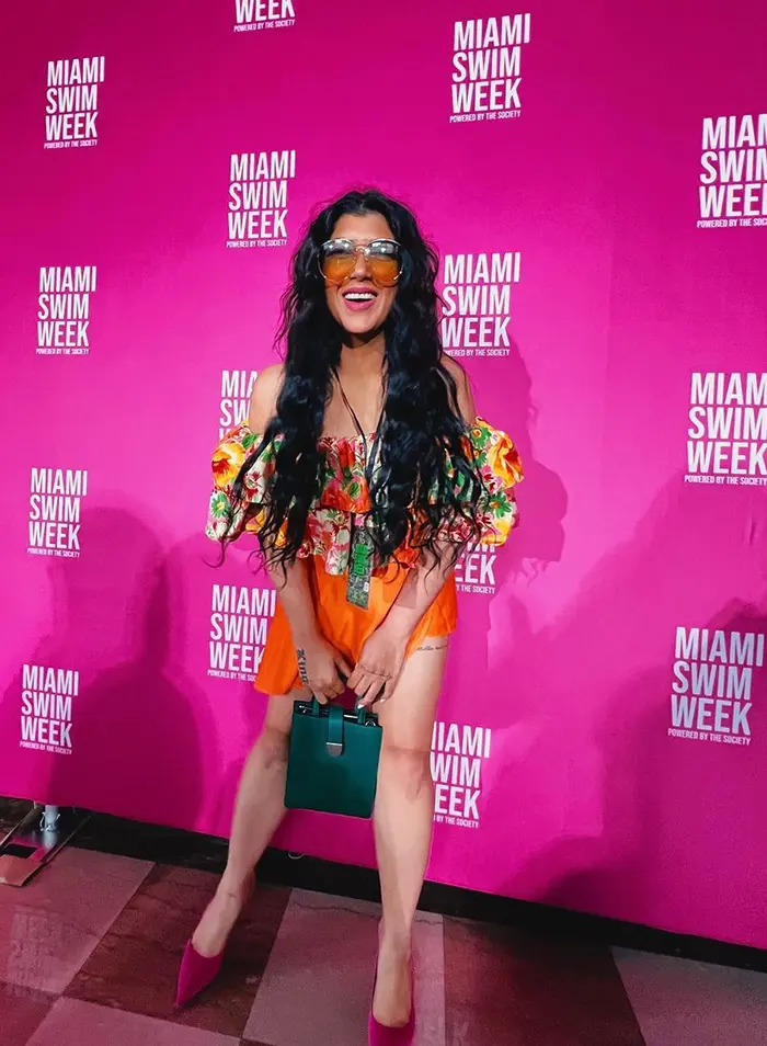 Designer presenting swimwear collection at Miami Swim Week runway
